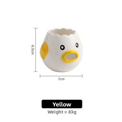 Yellow ceramic chick egg white separator with a yellow beak and size dimensions on a white background