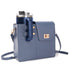 Blue STAN Sack crossbody bag with side cup holder holding a tumbler, front view